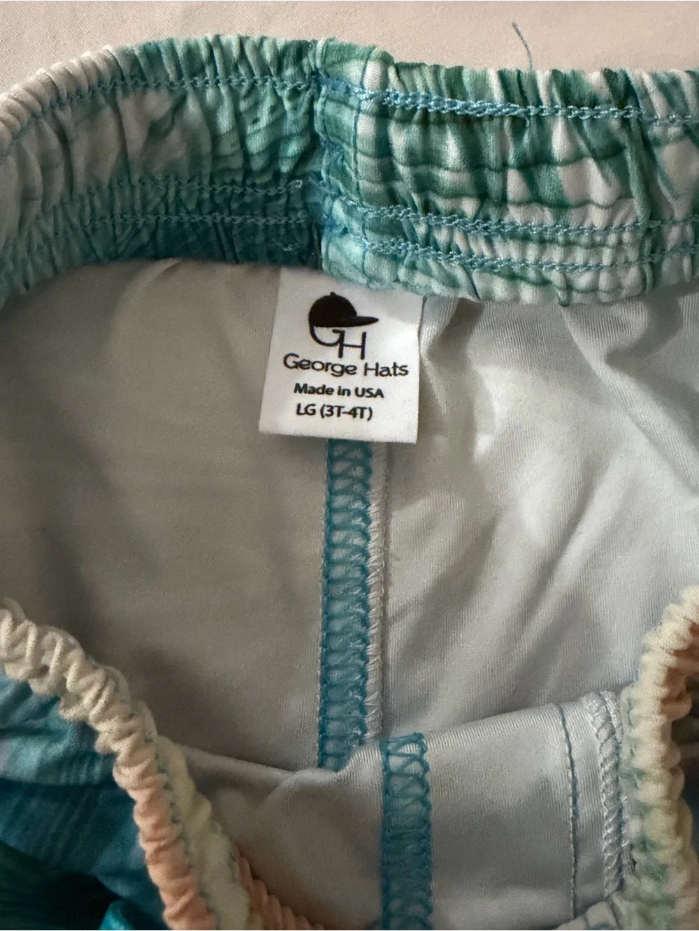 Kids Teal Palm-Print Swim Trunks